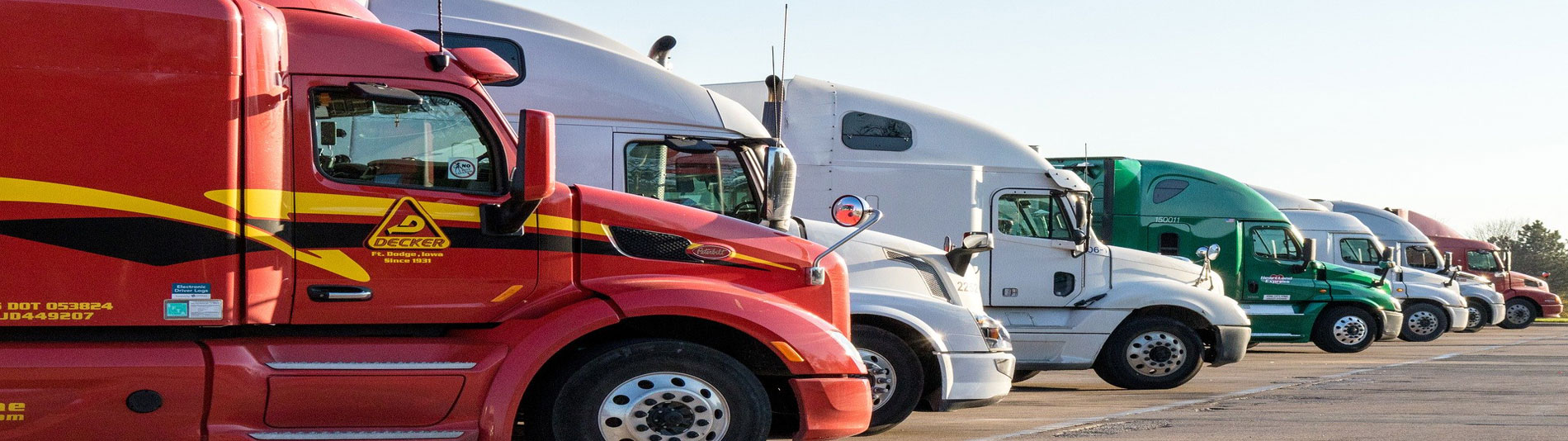 Heavy-duty trucks lined up for service
